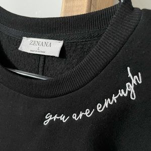 Black crew neck sweatshirt with pockets